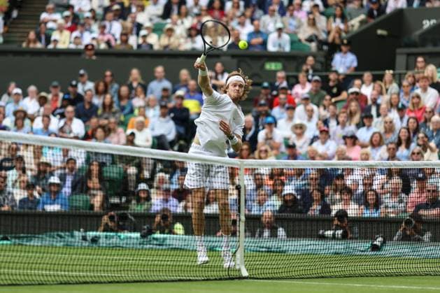 Wimbledon: Day Nine 11 July 2023, Wimbledon - Wimbledon Tennis Championships - Day Nine - Andrey Rublev smashes the ball down over the net - Photo: Charlotte Wilson Offside. Wimbledon UK Copyright: xCharlottexWilsonx xOffsidexOffside