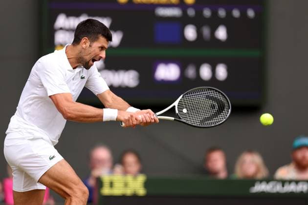 11th July 2023; All England Lawn Tennis and Croquet Club, London, England: Wimbledon Tennis Tournament; Novak Djokovic plays a backhand shot to Andrey Rublev , mens singles quarter final  ActionPlus12530455 ShaunxBrooks