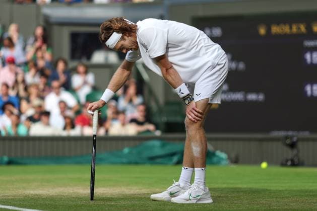 Wimbledon: Day Nine 11 July 2023, Wimbledon - Wimbledon Tennis Championships - Day Nine - Andrey Rublev leans on his racket after a tough rally - Photo: Charlotte Wilson Offside. Wimbledon UK Copyright: xCharlottexWilsonx xOffsidexOffside