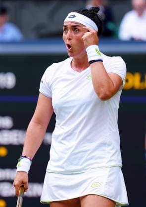 Mandatory Credit: Photo by Javier Garcia Shutterstock (14006839da) Ons Jabeur gestures during her quarter final match Wimbledon Tennis Championships, Day 10, The All England Lawn Tennis and Croquet Club, London, UK - 12 Jul 2023 Wimbledon Tennis Championships, Day 10, The All England Lawn Tennis and Croquet Club, London, UK - 12 Jul 2023  Copyright: xJavierxGarcia Shutterstockx 14006839da