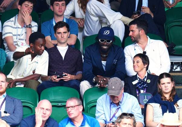Mandatory Credit: Photo by Javier Garcia Shutterstock (14006839em) Rudolphe Mdlongwa, Billy Harris and Kojey Radical watching the action on Centre Court Wimbledon Tennis Championships, Day 10, The All England Lawn Tennis and Croquet Club, London, UK - 12 Jul 2023 Wimbledon Tennis Championships, Day 10, The All England Lawn Tennis and Croquet Club, London, UK - 12 Jul 2023  Copyright: xJavierxGarcia Shutterstockx 14006839em