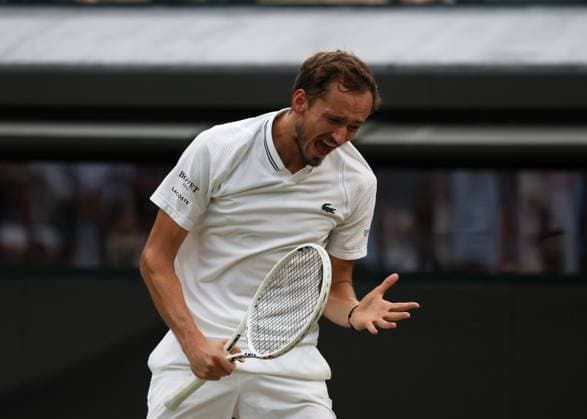 12th July 2023; All England Lawn Tennis and Croquet Club, London, England: Wimbledon Tennis Tournament; Daniil& xa0;Medvedev (RUS) reacts in anger after his shot to Christopher& xa0;Eubanks (USA) hits the net  ActionPlus12530781 JohnxPatrickxFletcher