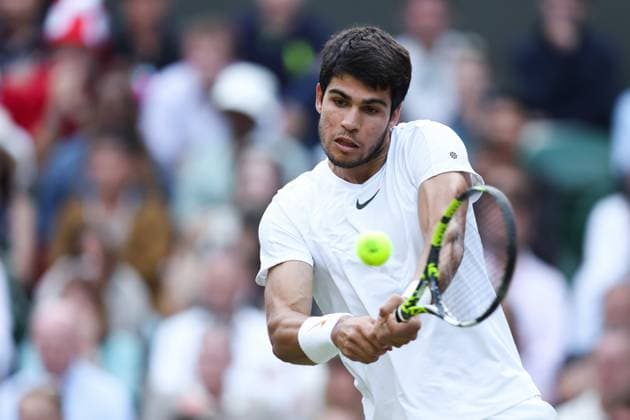 Wimbledon: Day Ten 12 July 2023, Wimbledon - Wimbledon Tennis Championships - Day Ten - Carlos Alcaraz (ESP) in action during his Gentlemen s Singles Quarter Finals match against Holger Rune (DEN) - Photo: Charlotte Wilson Offside. Wimbledon UK Copyright: xCharlottexWilsonx xOffsidexOffside