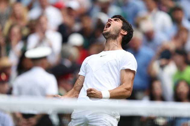 Wimbledon: Day Ten 12 July 2023, Wimbledon - Wimbledon Tennis Championships - Day Ten - Carlos Alcaraz (ESP) celebrates victory in his Gentlemen s Singles Quarter Finals match against Holger Rune (DEN) - Photo: Charlotte Wilson Offside. Wimbledon UK Copyright: xCharlottexWilsonx xOffsidexOffside