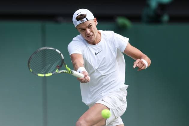 Wimbledon: Day Ten 12 July 2023, Wimbledon - Wimbledon Tennis Championships - Day Ten - Holger Rune (DEN) in action during his Gentlemen s Singles Quarter Finals match against Carlos Alcaraz (ESP) - Photo: Charlotte Wilson Offside. Wimbledon UK Copyright: xCharlottexWilsonx xOffsidexOffside