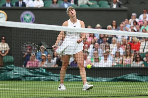 Wimbledon: Day Eleven 13 July 2023, Wimbledon - Wimbledon Tennis Championships - Day Eleven - Elina Svitolina (UKR) looks dejected after hitting the ball at the net during her Ladies Singles Semi Finals match against Marketa Vondrousova (CZE) - Photo: Charlotte Wilson Offside. Wimbledon UK Copyright: xCharlottexWilsonx xOffsidexOffside