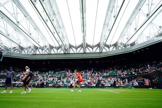 Mandatory Credit: Photo by Javier Garcia Shutterstock (14006845bp) Ons Jabeur and Aryna Sabalenka walk onto court ahead of their semi final match Wimbledon Tennis Championships, Day 11, The All England Lawn Tennis and Croquet Club, London, UK - 13 Jul 2023 Wimbledon Tennis Championships, Day 11, The All England Lawn Tennis and Croquet Club, London, UK - 13 Jul 2023  Copyright: xJavierxGarcia Shutterstockx 14006845bp
