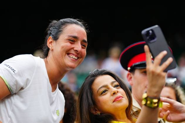 Mandatory Credit: Photo by Javier Garcia Shutterstock (14006845fd) Ons Jabeur celebrates victory in her her semi final match and poses for photos with fans Wimbledon Tennis Championships, Day 11, The All England Lawn Tennis and Croquet Club, London, UK - 13 Jul 2023 Wimbledon Tennis Championships, Day 11, The All England Lawn Tennis and Croquet Club, London, UK - 13 Jul 2023  Copyright: xJavierxGarcia Shutterstockx 14006845fd