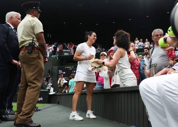 Wimbledon: Day Eleven 13 July 2023, Wimbledon - Wimbledon Tennis Championships - Day Eleven - Ons Jabeur (TUN) interacts with spectators after her Ladies Singles Semi Finals match victory against Aryna Sabalenka - Photo: Charlotte Wilson Offside. Wimbledon UK Copyright: xCharlottexWilsonx xOffsidexOffside
