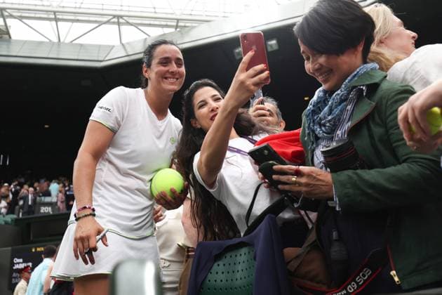 Wimbledon: Day Eleven 13 July 2023, Wimbledon - Wimbledon Tennis Championships - Day Eleven - Ons Jabeur (TUN) interacts with spectators after her Ladies Singles Semi Finals match victory against Aryna Sabalenka - Photo: Charlotte Wilson Offside. Wimbledon UK Copyright: xCharlottexWilsonx xOffsidexOffside
