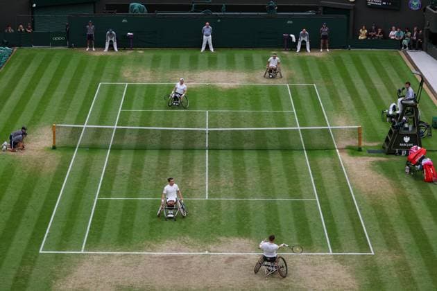13th July 2023; All England Lawn Tennis and Croquet Club, London, England: Wimbledon Tennis Tournament; Alfie Hewett (GBR) with a forehand shot to Gustavo Fernandez (ARG) mens doubles wheelchair semi-final  ActionPlus12531144 JohnxPatrickxFletcher