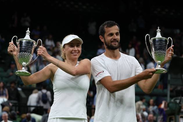 Sport Themen der Woche KW28 13th July 2023; All England Lawn Tennis and Croquet Club, London, England: Wimbledon Tennis Tournament; Lyudmyla& xa0;Kichenok (UKR) and Mate& xa0;Pavic (CRO) lift the Mixed Doubles Trophy after defeating Joran& xa0;Vliegen (BEL) and Yifan& xa0;Xu (CHN)  ActionPlus12531151 JohnxPatrickxFletcher