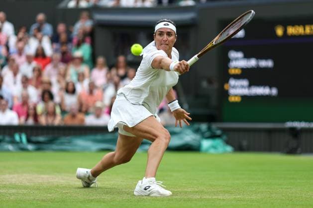 Wimbledon: Day Eleven 13 July 2023, Wimbledon - Wimbledon Tennis Championships - Day Eleven - Ons Jabeur (TUN) stretches to play a backhand - Photo: Charlotte Wilson Offside. Wimbledon UK Copyright: xCharlottexWilsonx xOffsidexOffside