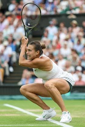 Wimbledon: Day Eleven 13 July 2023, Wimbledon - Wimbledon Tennis Championships - Day Eleven - Aryna Sabalenka crouches after returning the ball - Photo: Charlotte Wilson Offside. Wimbledon UK Copyright: xCharlottexWilsonx xOffsidexOffside