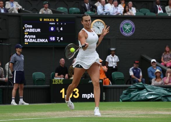 13th July 2023; All England Lawn Tennis and Croquet Club, London, England: Wimbledon Tennis Tournament; Aryna Sabalenka (BLR) with a forehand shot to Ons Jabeur (TUN)  ActionPlus12531168 JohnxPatrickxFletcher