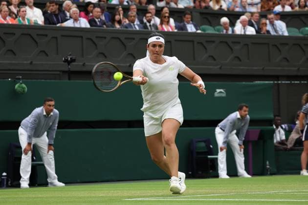 13th July 2023; All England Lawn Tennis and Croquet Club, London, England: Wimbledon Tennis Tournament; Ons Jabeur (TUN) returns to Aryna Sabalenka (BLR)  ActionPlus12531173 JohnxPatrickxFletcher