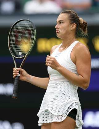 (230714) -- LONDON, July 14, 2023 -- Aryna Sabalenka reacts during the women s singles semifinal between Ons Jabeur of Tunisia and Aryna Sabalenka of Belarus at Wimbledon tennis championship in London, Britain, on July 13, 2023. ) (SP) BRITAIN-LONDON-TENNIS-WIMBLEDON-DAY 11 HanxYan 