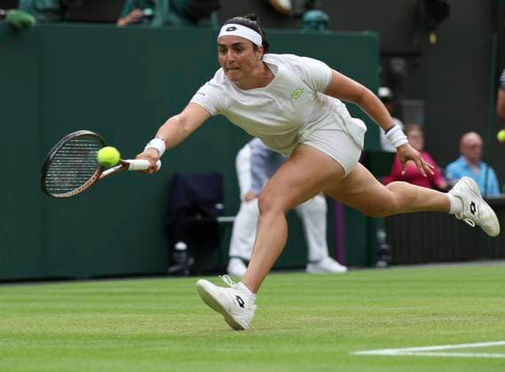 (230714) -- LONDON, July 14, 2023 -- Ons Jabeur competes during the women s singles semifinal between Ons Jabeur of Tunisia and Aryna Sabalenka of Belarus at Wimbledon tennis championship in London, Britain, on July 13, 2023. ) (SP) BRITAIN-LONDON-TENNIS-WIMBLEDON-DAY 11 HanxYan 