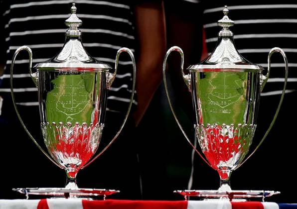 (230714) -- LONDON, July 14, 2023 -- Trophies are seen during the awarding ceremony after the mixed doubles final match between Xu Yifan of China Joran Vliegen of Belgium and Mate Pavic of Croatia Lyudmyla Kichenok of Ukraine at Wimbledon tennis Championship in London, Britain, on July 13, 2023. ) (SP)BRITAIN-LONDON-TENNIS-WIMBLEDON-DAY 11 LixYing 