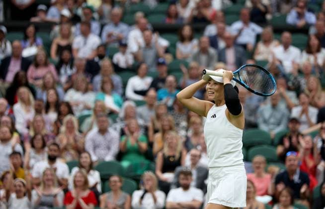 (230714) -- LONDON, July 14, 2023 -- Xu Yifan reacts during the mixed doubles final match between Xu Yifan of China Joran Vliegen of Belgium and Mate Pavic of Croatia Lyudmyla Kichenok of Ukraine at Wimbledon tennis Championship in London, Britain, on July 13, 2023. ) (SP)BRITAIN-LONDON-TENNIS-WIMBLEDON-DAY 11 LixYing 