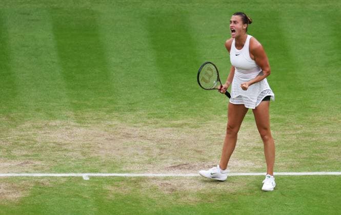 (230714) -- LONDON, July 14, 2023 -- Aryna Sabalenka reacts during the women s singles semifinal between Ons Jabeur of Tunisia and Aryna Sabalenka of Belarus at Wimbledon tennis championship in London, Britain, on July 13, 2023. ) (SP) BRITAIN-LONDON-TENNIS-WIMBLEDON-DAY 11 LixYing 