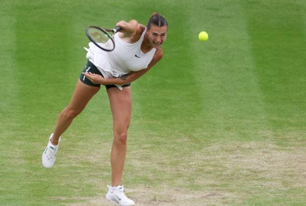 (230714) -- LONDON, July 14, 2023 -- Aryna Sabalenka serves during the women s singles semifinal between Ons Jabeur of Tunisia and Aryna Sabalenka of Belarus at Wimbledon tennis championship in London, Britain, on July 13, 2023. ) (SP) BRITAIN-LONDON-TENNIS-WIMBLEDON-DAY 11 LixYing 