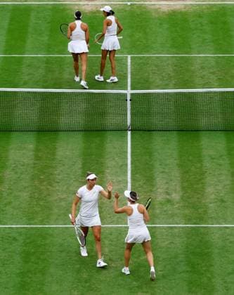 Mandatory Credit: Photo by Kieran McManus Shutterstock (14009604s) Elise Mertens of Belgium and Storm Hunter of Australia celebrate during their Ladies Doubles Semi Final match. Wimbledon Tennis Championships, Day 12, The All England Lawn Tennis and Croquet Club, London, UK - 14 Jul 2023 Wimbledon Tennis Championships, Day 12, The All England Lawn Tennis and Croquet Club, London, UK - 14 Jul 2023  Copyright: xKieranxMcManus Shutterstockx 14009604s