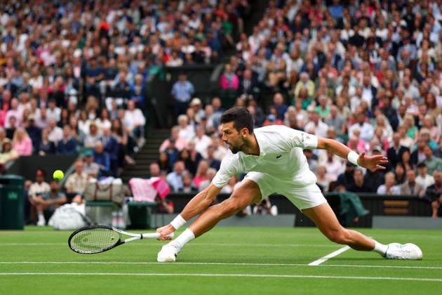 Mandatory Credit: Photo by Ella Ling Shutterstock (14009603ao) Novak Djokovic during his semi final match Wimbledon Tennis Championships, Day 12, The All England Lawn Tennis and Croquet Club, London, UK - 14 Jul 2023 Wimbledon Tennis Championships, Day 12, The All England Lawn Tennis and Croquet Club, London, UK - 14 Jul 2023  Copyright: xEllaxLing Shutterstockx 14009603ao