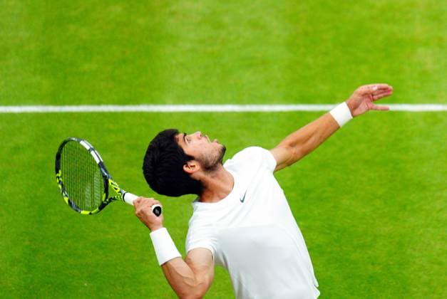 Mandatory Credit: Photo by Javier Garcia Shutterstock (14009601dp) Carlos Alcaraz during his semi final match Wimbledon Tennis Championships, Day 12, The All England Lawn Tennis and Croquet Club, London, UK - 14 Jul 2023 Wimbledon Tennis Championships, Day 12, The All England Lawn Tennis and Croquet Club, London, UK - 14 Jul 2023  Copyright: xJavierxGarcia Shutterstockx 14009601dp