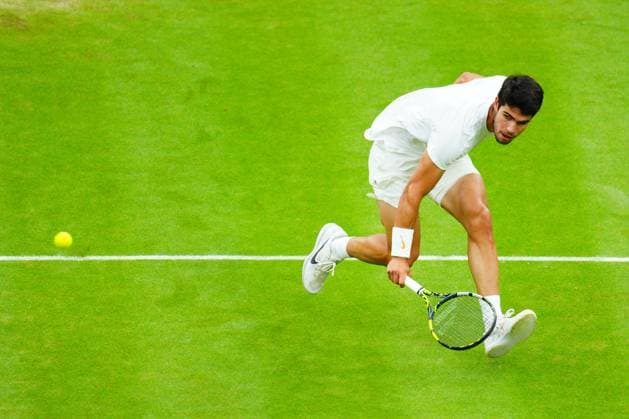 Mandatory Credit: Photo by Javier Garcia Shutterstock (14009601dr) Carlos Alcaraz during his semi final match Wimbledon Tennis Championships, Day 12, The All England Lawn Tennis and Croquet Club, London, UK - 14 Jul 2023 Wimbledon Tennis Championships, Day 12, The All England Lawn Tennis and Croquet Club, London, UK - 14 Jul 2023  Copyright: xJavierxGarcia Shutterstockx 14009601dr