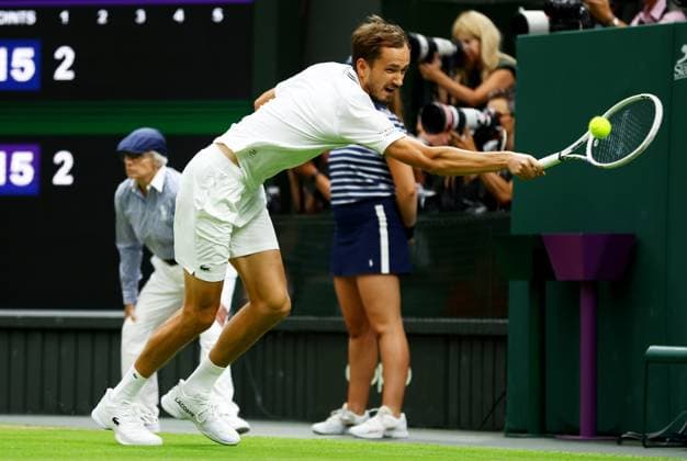 Mandatory Credit: Photo by Kieran McManus Shutterstock (14009604dn) Daniil Medvedev of Russia in action during his Semi Final match. Wimbledon Tennis Championships, Day 12, The All England Lawn Tennis and Croquet Club, London, UK - 14 Jul 2023 Wimbledon Tennis Championships, Day 12, The All England Lawn Tennis and Croquet Club, London, UK - 14 Jul 2023  Copyright: xKieranxMcManus Shutterstockx 14009604dn