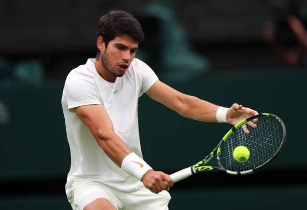Mandatory Credit: Photo by Ella Ling Shutterstock (14009603do) Carlos Alcaraz during his semi final match Wimbledon Tennis Championships, Day 12, The All England Lawn Tennis and Croquet Club, London, UK - 14 Jul 2023 Wimbledon Tennis Championships, Day 12, The All England Lawn Tennis and Croquet Club, London, UK - 14 Jul 2023  Copyright: xEllaxLing Shutterstockx 14009603do