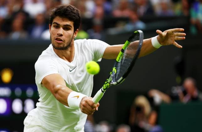 Mandatory Credit: Photo by Kieran McManus Shutterstock (14009604en) Carlos Alcaraz of Spain in action during his Semi Final match. Wimbledon Tennis Championships, Day 12, The All England Lawn Tennis and Croquet Club, London, UK - 14 Jul 2023 Wimbledon Tennis Championships, Day 12, The All England Lawn Tennis and Croquet Club, London, UK - 14 Jul 2023  Copyright: xKieranxMcManus Shutterstockx 14009604en