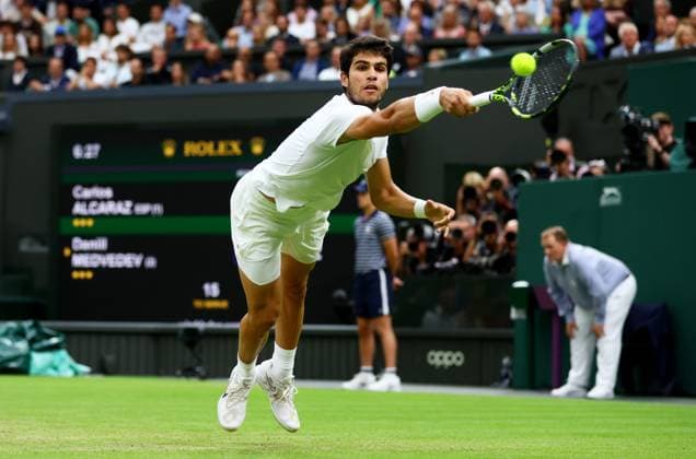 Mandatory Credit: Photo by Kieran McManus Shutterstock (14009604fe) Carlos Alcaraz of Spain in action during his Semi Final match. Wimbledon Tennis Championships, Day 12, The All England Lawn Tennis and Croquet Club, London, UK - 14 Jul 2023 Wimbledon Tennis Championships, Day 12, The All England Lawn Tennis and Croquet Club, London, UK - 14 Jul 2023  Copyright: xKieranxMcManus Shutterstockx 14009604fe
