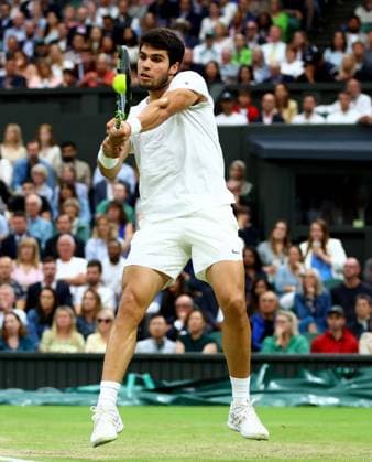 Mandatory Credit: Photo by Kieran McManus Shutterstock (14009604ff) Carlos Alcaraz of Spain in action during his Semi Final match. Wimbledon Tennis Championships, Day 12, The All England Lawn Tennis and Croquet Club, London, UK - 14 Jul 2023 Wimbledon Tennis Championships, Day 12, The All England Lawn Tennis and Croquet Club, London, UK - 14 Jul 2023  Copyright: xKieranxMcManus Shutterstockx 14009604ff