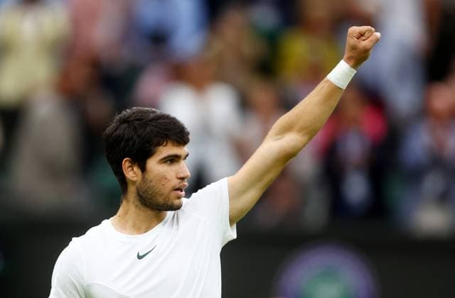 Mandatory Credit: Photo by Kieran McManus Shutterstock (14009604fy) Carlos Alcaraz of Spain celebrates winning his Semi Final match. Wimbledon Tennis Championships, Day 12, The All England Lawn Tennis and Croquet Club, London, UK - 14 Jul 2023 Wimbledon Tennis Championships, Day 12, The All England Lawn Tennis and Croquet Club, London, UK - 14 Jul 2023  Copyright: xKieranxMcManus Shutterstockx 14009604fy