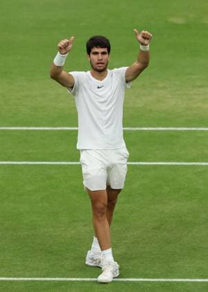 14th July 2023; All England Lawn Tennis and Croquet Club, London, England: Wimbledon Tennis Tournament; Carlos Alcaraz (ESP) gives the thumbs up to the crowd after defeating Daniil Medvedev (RUS) in three sets to reach the final against Novak Djokovic (SRB)  ActionPlus12531291 JohnxPatrickxFletcher