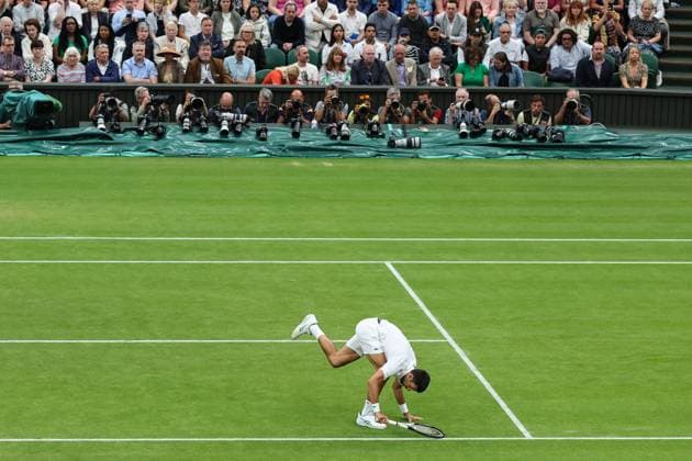 Wimbledon: Day Twelve 14 July 2023, Wimbledon - Wimbledon Tennis Championships - Day Twelve - Novak Djokovic (SRB) slips - Photo: Charlotte Wilson Offside. Wimbledon UK Copyright: xCharlottexWilsonx xOffsidexOffside