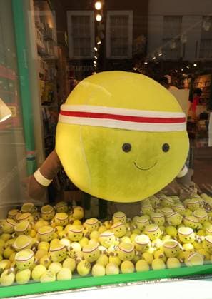 Tennis - 2023 Wimbledon Championships - Week Two - Day Thirteen - All England lawn Tennis & Racquet Club, Wimbledon -Saturday 15th Ladies final - Marketa Vondrousova (CZE) v Ons Jabeur Tennis balls - Wimbledon Village Shops in the High street 