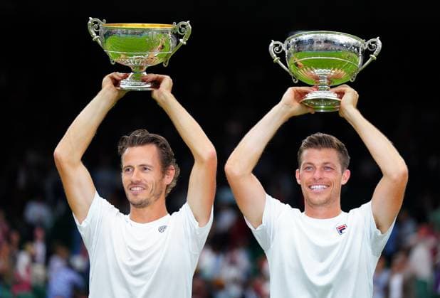 Mandatory Credit: Photo by Javier Garcia Shutterstock (14010521hw) Wesley Koolhof and Neal Skupski celebrate victory in the Gentlemen s Dobles final Wimbledon Tennis Championships, Day 13, The All England Lawn Tennis and Croquet Club, London, UK - 15 Jul 2023 Wimbledon Tennis Championships, Day 13, The All England Lawn Tennis and Croquet Club, London, UK - 15 Jul 2023  Copyright: xJavierxGarcia Shutterstockx 14010521hw