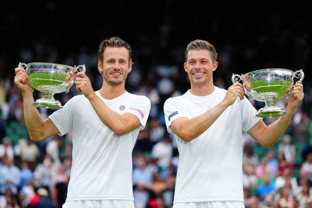 Mandatory Credit: Photo by Javier Garcia Shutterstock (14010521hx) Wesley Koolhof and Neal Skupski celebrate victory in the Gentlemen s Dobles final Wimbledon Tennis Championships, Day 13, The All England Lawn Tennis and Croquet Club, London, UK - 15 Jul 2023 Wimbledon Tennis Championships, Day 13, The All England Lawn Tennis and Croquet Club, London, UK - 15 Jul 2023  Copyright: xJavierxGarcia Shutterstockx 14010521hx