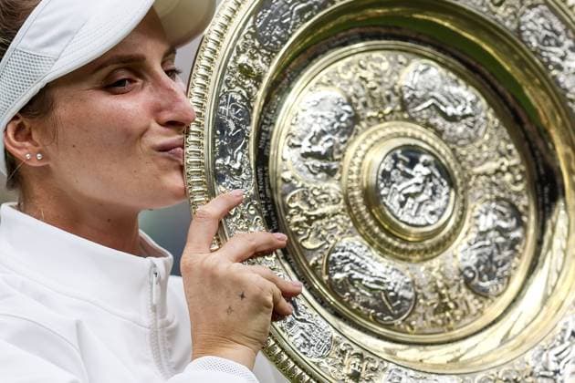 Wimbledon: Day Thirteen 15 July 2023, Wimbledon - Wimbledon Tennis Championships - Day Thirteen - Marketa Vondrousova (CZE) kisses the trophy after victory in the Women™s Singles Final - Photo: Charlotte Wilson Offside. Wimbledon UK Copyright: xCharlottexWilsonx xOffsidexOffside