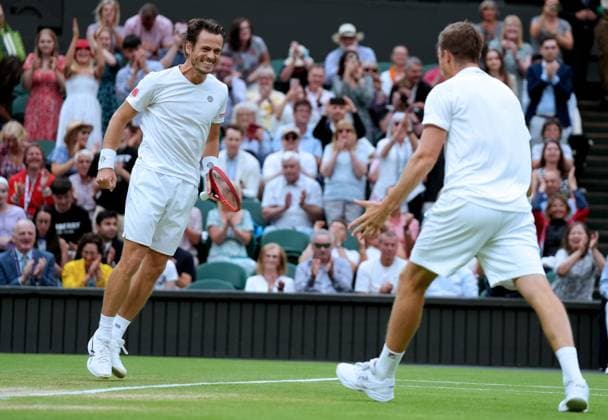 (230716) -- LONDON, July 16, 2023 -- Wesley Koolhof (L) Neal Skupski celebrate after the men s doubles final match between Wesley Koolhof of the Netherlands Neal Skupski of Britain and Marcel Granollers of Spain Horacio Zeballos of Argentina at Wimbledon tennis Championship in London, Britain, on July 15, 2023. ) (SP)BRITAIN-LONDON-TENNIS-WIMBLEDON-MEN S DOUBLES-FINAL LixYing 