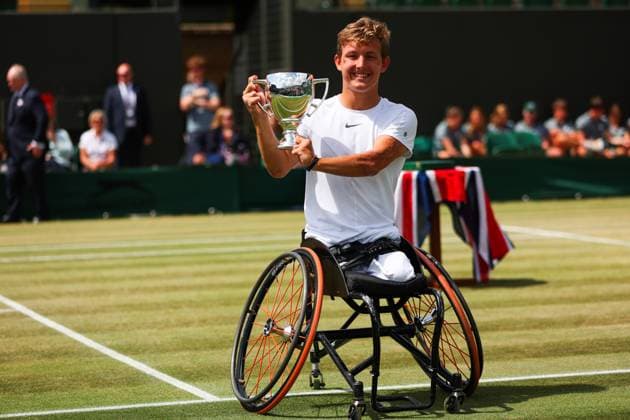 Mandatory Credit: Photo by Ella Ling Shutterstock (14011309l) Niels Vink wins in the Quad Wheelchair singles final and celebrates with the trophy Wimbledon Tennis Championships, Day 14, The All England Lawn Tennis and Croquet Club, London, UK - 16 Jul 2023 Wimbledon Tennis Championships, Day 14, The All England Lawn Tennis and Croquet Club, London, UK - 16 Jul 2023  Copyright: xEllaxLing Shutterstockx 14011309l