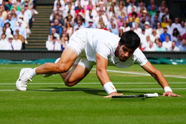 Mandatory Credit: Photo by Javier Garcia Shutterstock (14011311ex) Carlos Alcaraz falls during the Men s Singles final Wimbledon Tennis Championships, Day 14, The All England Lawn Tennis and Croquet Club, London, UK - 16 Jul 2023 Wimbledon Tennis Championships, Day 14, The All England Lawn Tennis and Croquet Club, London, UK - 16 Jul 2023  Copyright: xJavierxGarcia Shutterstockx 14011311ex