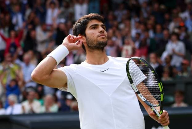 Mandatory Credit: Photo by Ella Ling Shutterstock (14011309dx) Carlos Alcaraz cups his ear during the Men s Singles final Wimbledon Tennis Championships, Day 14, The All England Lawn Tennis and Croquet Club, London, UK - 16 Jul 2023 Wimbledon Tennis Championships, Day 14, The All England Lawn Tennis and Croquet Club, London, UK - 16 Jul 2023  Copyright: xEllaxLing Shutterstockx 14011309dx