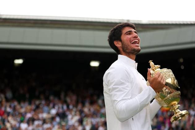 Mandatory Credit: Photo by Ella Ling Shutterstock (14011309hl) Carlos Alcaraz lifts the The Gentlemen s Singles Trophy after victory Wimbledon Tennis Championships, Day 14, The All England Lawn Tennis and Croquet Club, London, UK - 16 Jul 2023 Wimbledon Tennis Championships, Day 14, The All England Lawn Tennis and Croquet Club, London, UK - 16 Jul 2023  Copyright: xEllaxLing Shutterstockx 14011309hl