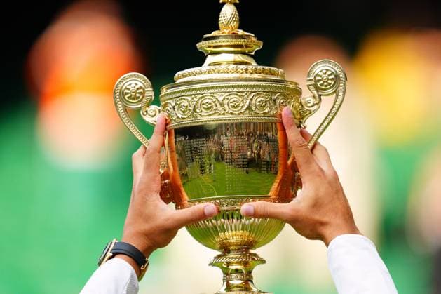 Mandatory Credit: Photo by Javier Garcia Shutterstock (14011311ko) Carlos Alcaraz lifts the The Gentlemen s Singles Trophy after victory Wimbledon Tennis Championships, Day 14, The All England Lawn Tennis and Croquet Club, London, UK - 16 Jul 2023 Wimbledon Tennis Championships, Day 14, The All England Lawn Tennis and Croquet Club, London, UK - 16 Jul 2023  Copyright: xJavierxGarcia Shutterstockx 14011311ko