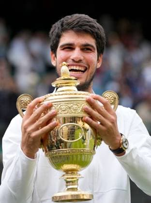 Mandatory Credit: Photo by Dave Shopland Shutterstock (14011307jk) Carlos Alcaraz lifts the The Gentlemen s Singles Trophy after victory Wimbledon Tennis Championships, Day 14, The All England Lawn Tennis and Croquet Club, London, UK - 16 Jul 2023 Wimbledon Tennis Championships, Day 14, The All England Lawn Tennis and Croquet Club, London, UK - 16 Jul 2023  Copyright: xDavexShopland Shutterstockx 14011307jk