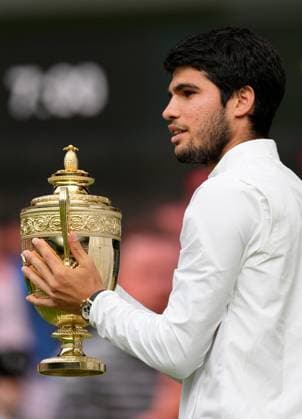 Mandatory Credit: Photo by Dave Shopland Shutterstock (14011307kp) Carlos Alcaraz lifts the The Gentlemen s Singles Trophy after victory Wimbledon Tennis Championships, Day 14, The All England Lawn Tennis and Croquet Club, London, UK - 16 Jul 2023 Wimbledon Tennis Championships, Day 14, The All England Lawn Tennis and Croquet Club, London, UK - 16 Jul 2023  Copyright: xDavexShopland Shutterstockx 14011307kp